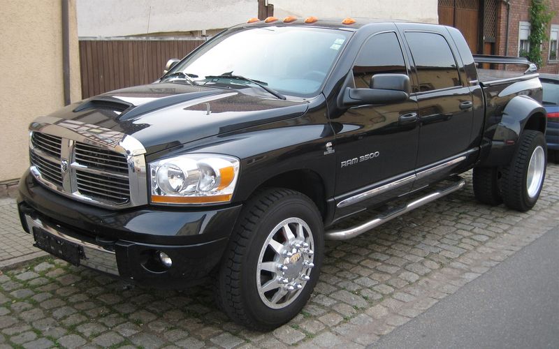 Black 2006 Dodge Ram 3500 Mega Cab dually 4x4, front three-quarter view
